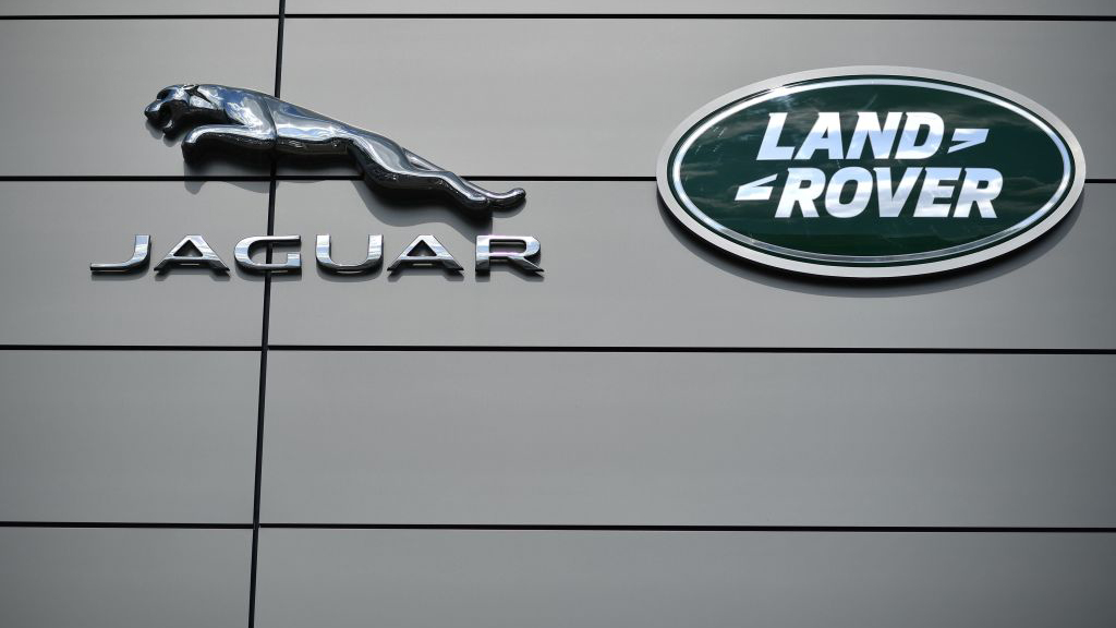 Rearview camera view showing distorted image due to water pooling in a Land Rover Range Rover
